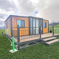 Maison de conteneur modulaire pliable extensible en acier à isolation thermique et imperméable de 20 pieds et 40 pieds, personnalisée en gros