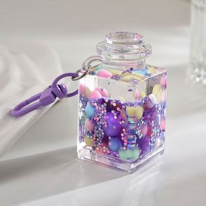 Porte-clés Bouteille de Sable Liquide - Pendentif Sablier en Acrylique pour Sacs, Sacs à Dos et Décoration de Sacs à Main - Product Image 4