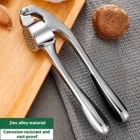 Mini presse-pâte manuelle en alliage de zinc pour fruits et légumes pour biscuits au gingembre et aux noix Outil manuel pour l'ail