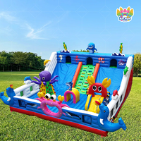 Toboggan aquatique gonflable pour animaux marins, double piste, mur d'escalade, parc de jeux en PVC pour événements commerciaux