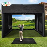 Tente de simulation de golf gonflable noire avec support de projecteur intégré pour la pratique du golf en extérieur dans la cour