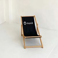 Chaise de plage pliable durable avec design réglable en bois et polyester