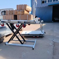 Chariot élévateur à ciseaux électrique 300kg Plate-forme de déchargement de chargement de restaurant d'entrepôt hydraulique portable