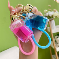 Huile acrylique dans une bouteille d'eau porte-clés porte-clés mignon créatif sac pendentif Quicksand flottant glaçon bouteille porte-clés liquide