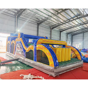 Parcours d'obstacles gonflable géant en PVC pour parcs d'attractions, avec toboggan et mur d'escalade, idéal pour les jeux sportifs et les événements de plein air. - Product Image 1