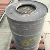 Pabrik Cina kalsium karbida CaC2 15-25mm dalam 100 kg drum besi