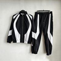 Ensemble survêtement coupe-vent homme noir et blanc color block, grande taille, veste et pantalon en nylon, style Gorpcore Streetwear, personnalisable OEM ODM, tendance