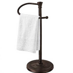 Traditional <b>Standing</b> <b>Towel</b> Rack With Round Base And Curved Arm For Bathroom Use Durable Metal Construction - Product Image 1