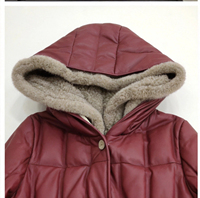 Nouveau manteau en cuir matelassé pour femme avec capuche et bordure en fourrure de vison pour l'hiver
