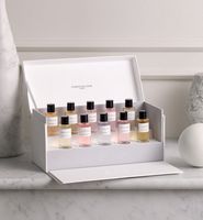 Ensemble de parfum de voyage premium de 8 ml avec atomiseur rotatif carré et emballage personnalisé en boîte-cadeau en carton