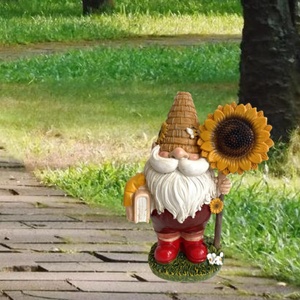 Statua Decorativa da Giardino a Forma di Gnomo, con Gnomo che Tiene un Girasole e un Libro, Ideale per Cortile, Prato e Portico - Product Image 4