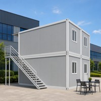 Maison conteneur démontable, panneau gris clair, cadre blanc, 2x2, deux étages avec point de levage pour bureau en parc industriel