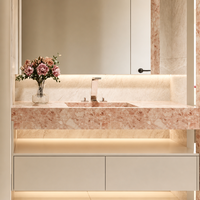 Meuble-lavabo mural moderne en marbre rose naturel avec vasque intégrée et plan de toilette en pierre