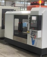 Centre d'usinage vertical 3 axes multifonctionnel pour le perçage, le fraisage et le taraudage de corps de robinet dissimulés en laiton pour salle de bain