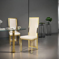 Chaise de salle à manger élégante de style moderne et contemporain avec dossier haut, structure en métal chromé doré et revêtement en cuir, pour la maison, le bureau et l'hôtel