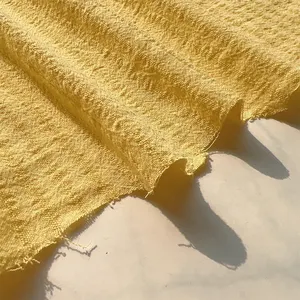 Tela arrugada lavada con arena de algodón para camisa Tela de ropa para niños