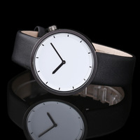 Montre à quartz ronde minimaliste nordique OEM, grand cadran uni, deux aiguilles, plusieurs options de bracelet en cuir, unisexe, pour un usage quotidien