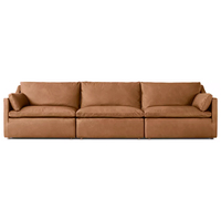 Canapé de salon moderne de luxe en cuir, modulaire, avec accoudoirs inclinables, coussins moelleux et doux, éco-responsable, personnalisable pour villa et appartement
