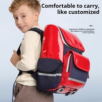 Sac à dos scolaire ergonomique breveté de 16 pouces compartiment géométrique étanche pour ordinateur portable système de soutien de la colonne vertébrale pour étudiants