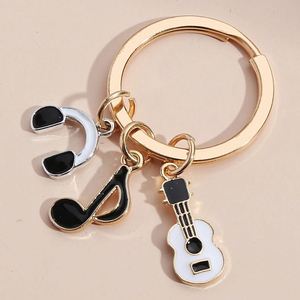 Nuevo y Popular Llavero Colgante para Bolso con Diseño de Notas Musicales, Fonógrafo, Teclado, Auriculares, Micrófono, Piano, Violín y Banda - Product Image 4