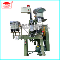Nouvelle machine pneumatique de perforation de boucles en jean haute précision pour le traitement de boucles à ressort en métal à cinq griffes quatre-en-un pour jeans