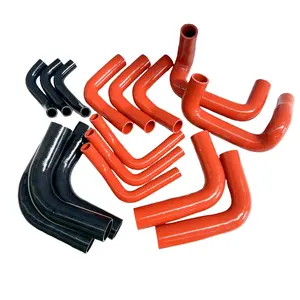 The Cooling System Of The Automotive Intercooler Is Connected To A Curved Silicone Rubber Hose