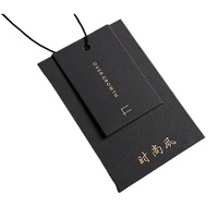 Étiquettes personnalisées de luxe en papier spécial estampage de logo noir rose or Étiquettes de mode en relief pour vêtements étiquettes de vêtement écologiques