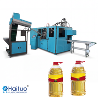 Machine professionnelle automatique de fabrication de bouteilles PET avec PLC, moteur de pompe haute productivité pour fût d'huile comestible de 20 L et grand bidon d'eau