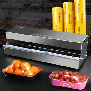 supermarket commercial fruit vegetable plastic wrap packing sealing machine