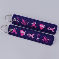 Llavero de metal rosa intenso con diseño de cinta tejida, colgante decorativo de doble cara, para certificados de oficina, mosquetón promocional