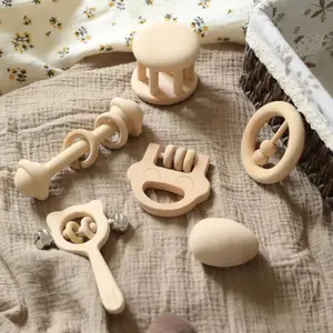 婴儿蒙特梭利铃铛玩具木制拨浪鼓和感官出牙器玩具婴儿手抓乐器出牙手铃拨浪鼓