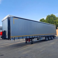 Semi-remorque à rideaux latéraux 3 essieux avec plancher en acier et anneaux de fixation