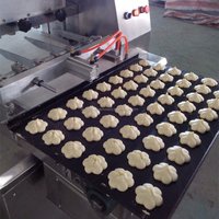 Matériel de boulangerie automatique machine à muffins cupcakes pour la fabrication de madeleines machine à déposer