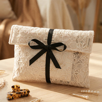 Pochette en dentelle élégante de luxe avec logo personnalisé, sac à bijoux personnalisé pour emballage cadeau de mariage, petit sac mini