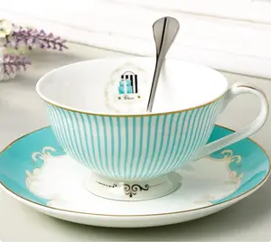 New bone china cup and saucer with stainless steel spoon