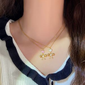 Collar Gargantilla Chapado en Oro de 18K para Mujer, con Circonitas Brillantes, Colgante de Corazón y Lazo Delicado - Product Image 6