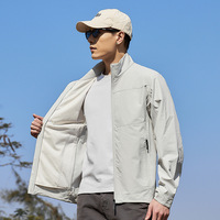 Nouvelle veste décontractée pour homme printemps-automne, imperméable, coupe-vent, multifonctionnelle, multi-poches, coupe ample, pour la randonnée en extérieur