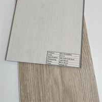 Carreaux de sol intérieurs en vinyle de luxe SPC à clipser, imitation marbre et grain de bois, imperméables, vente en gros directe usine Chine