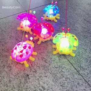 热销彩色儿童耐用玩具电动发光二极管瓢虫玩具带音乐牵引闪光玩具
