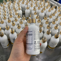 Machine de remplissage de liquides cosmétiques pour huile de massage corporel, sérum capillaire, huile de croissance des cheveux, huile réparatrice pour la peau avec bouchonnage et étiquetage