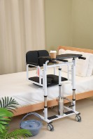 Fauteuil de transfert multifonctionnel manuel pliable en acier pour les patients âgés et handicapés
