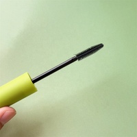 Mascara liquide noir 6,5 ml, cylindre transparent, bouchons verts mats, brosse à fibres spirales, approvisionnement en gros, logo personnalisé, maquillage cosmétique