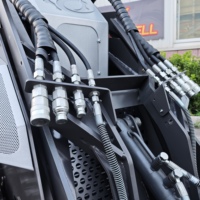 Chargeuse articulée compacte sur chenilles Cartiwell Mini pour chantier de construction