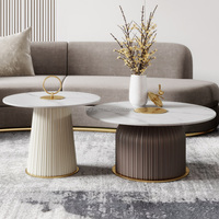 Ensemble de tables basses contemporaines italiennes et nordiques, style luxueux et moderne, pour salon, bureau ou maison, avec table centrale ronde mobile.