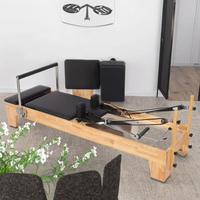 Machine de Pilates Reformer en chêne de haute qualité, durable, portable, réglable, adaptée à la santé, pour le corps et l'usage domestique