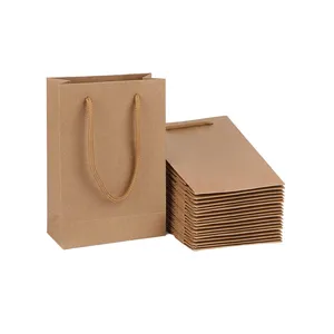 Sacs d'emballage en papier cadeau Kraft personnalisés en usine avec poignée en coton pour les achats d'affaires à emporter