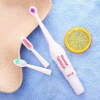 Cepillo de dientes eléctrico para masaje al por mayor, funcionamiento con batería, cabezales de cepillo múltiples, cepillo de dientes eléctrico portátil de viaje