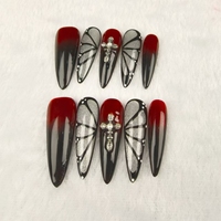 Venta al por mayor mariposa dibujada a mano negro y rojo uñas artacrílicas prensa en las uñas