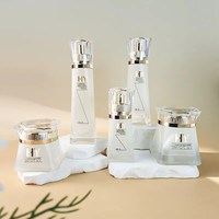 Fabrication de flacons cosmétiques 100ml 120ml Flacon de crème pour le visage Lotion Flacon en verre Emballage Ensemble cosmétique en verre pour les soins de la peau
