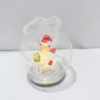 Adorno navideño de vidrio de borosilicato soplado a mano con iluminación LED con muñeco de nieve en el interior para decoración festiva